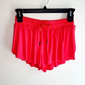 Red Athletic Shorts with Elastic Waistband and Flared Hem